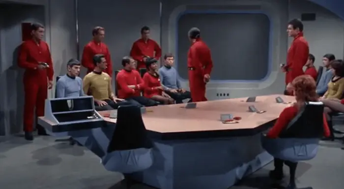 Khan holding the enterprise crew hostage.